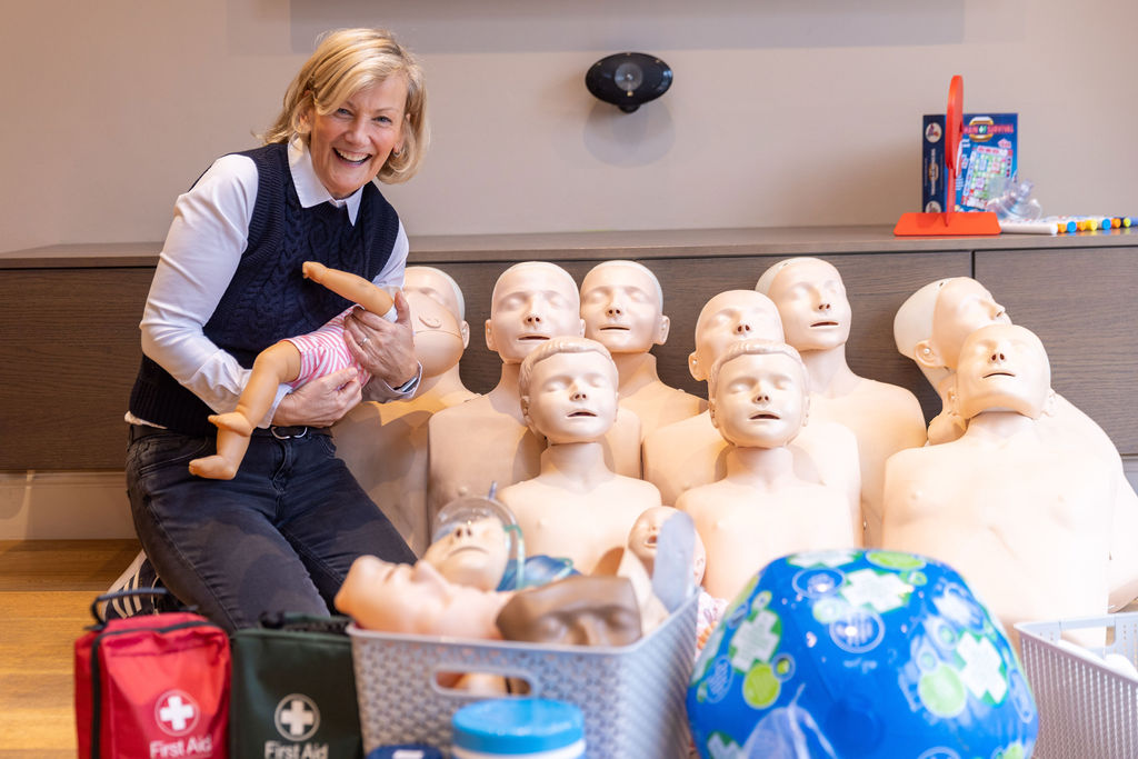 Colette with the CPR dummies for the first aid courses