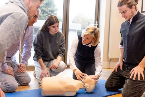 Breathing in CPR extension of the neck teaching first aid in London.